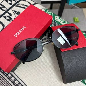 Солнцезащитные очки Prada PR A59S
